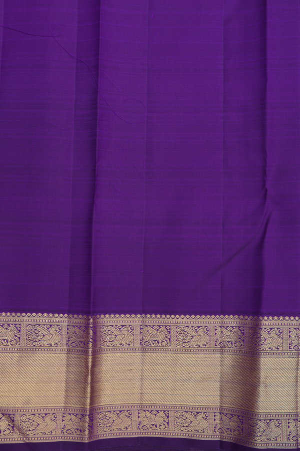 Kanchipuram Silk Saree In Royal Purple With Floral Buttis