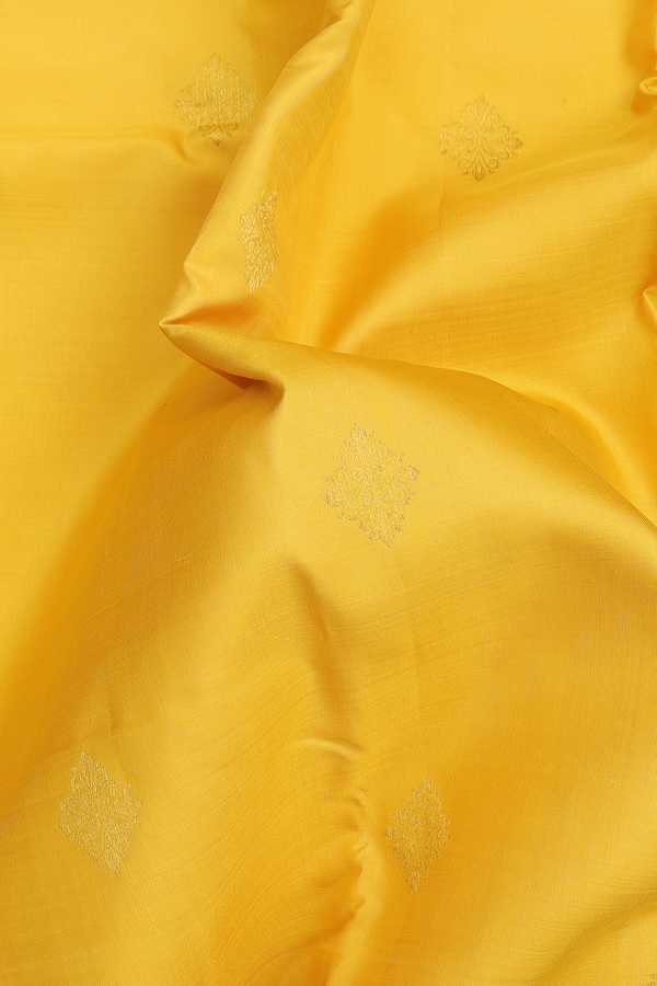 Kanchipuram Silk Saree In Yellow With Zari Buttas