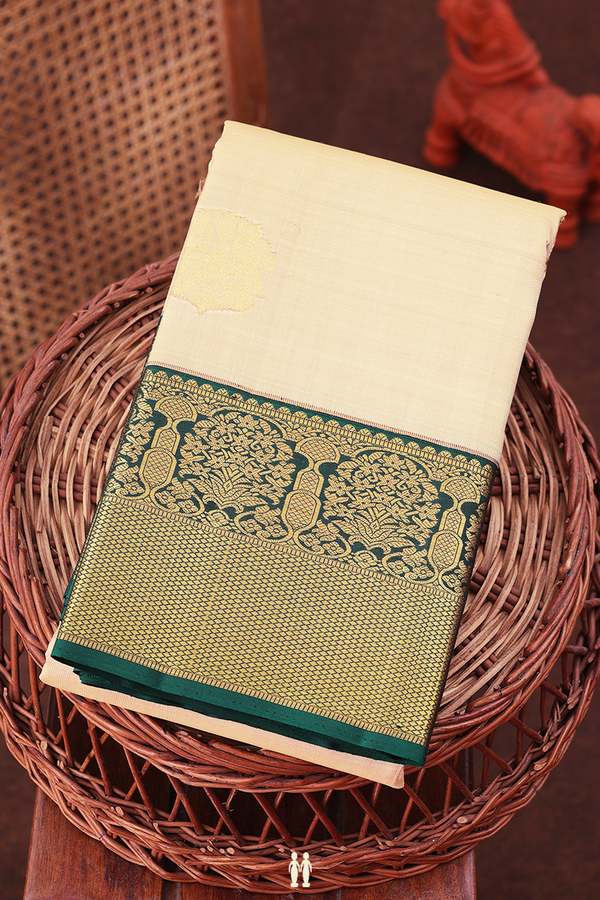 Kanchipuram Silk Saree In Cream Color With Peacock Motifs