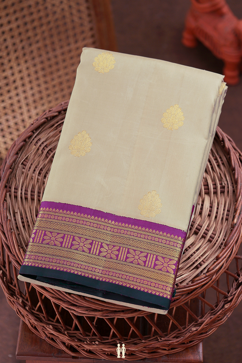Kanchipuram Silk Saree In Dusty Khaki With Zari Buttas