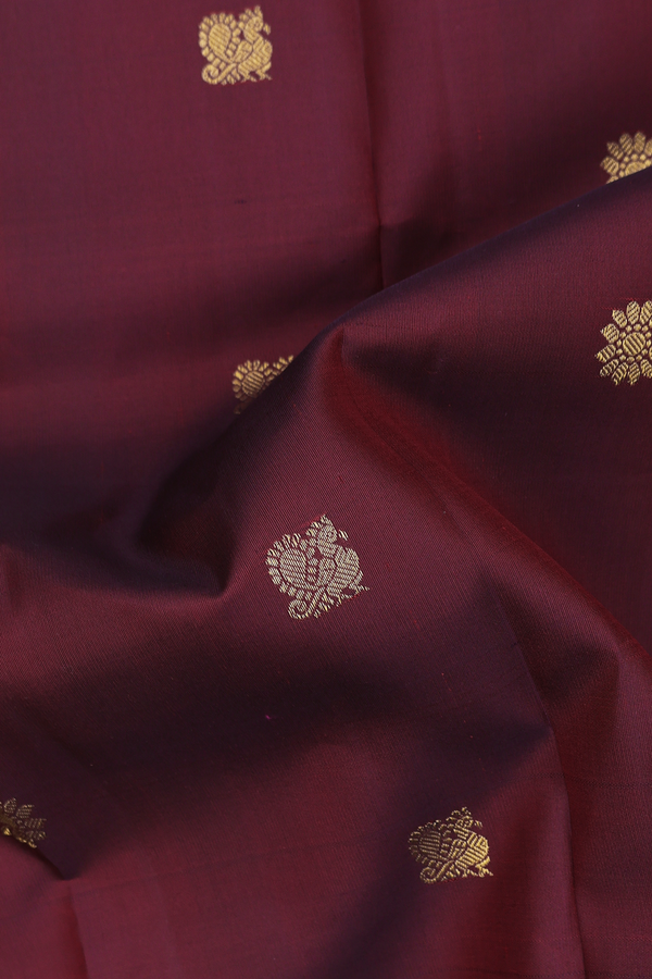 Kanchipuram Silk Saree In Berry Red With Peacock Buttas