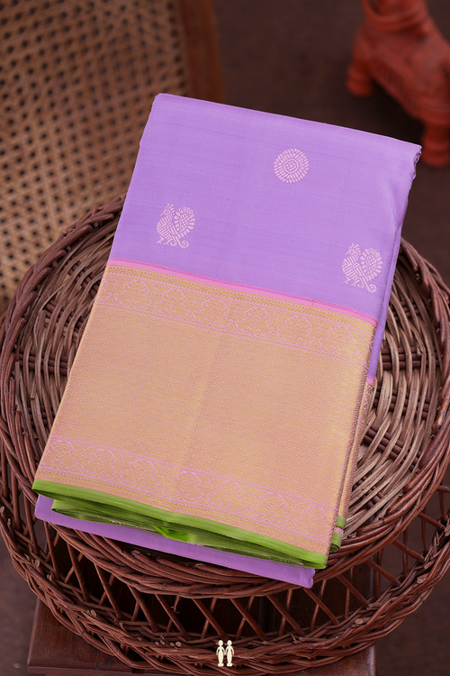 Kanchipuram Silk Saree In Lavender With Peacock Buttas