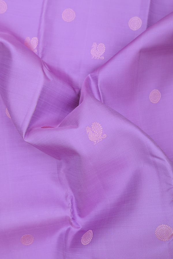 Kanchipuram Silk Saree In Lavender With Peacock Buttas