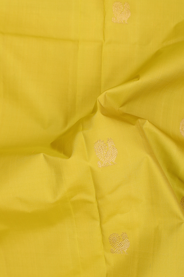 Kanchipuram Silk Saree In Yellow With Chakram Buttas