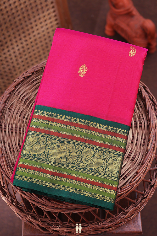 Kanchipuram Silk Saree In Rani Pink With Paisley Buttas