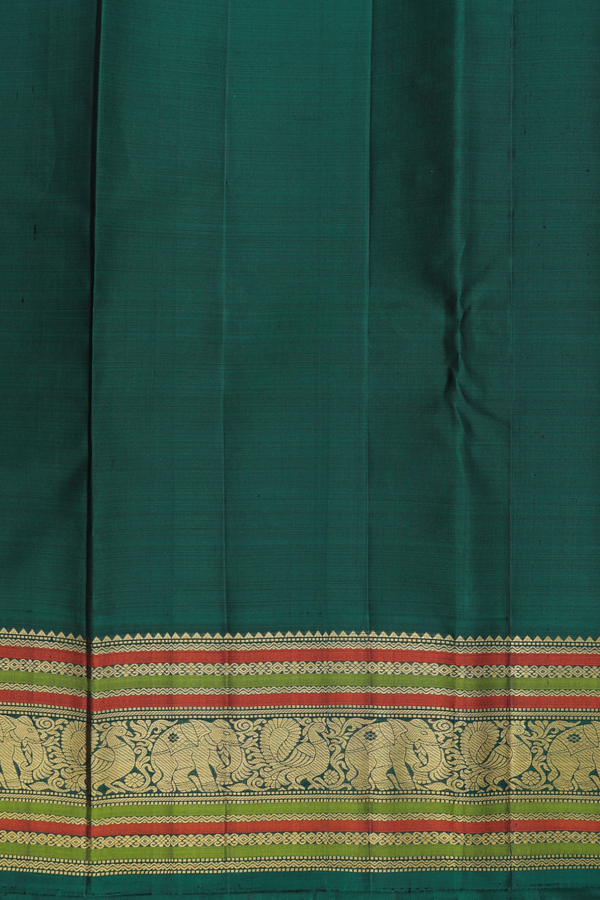 Kanchipuram Silk Saree In Rani Pink With Paisley Buttas