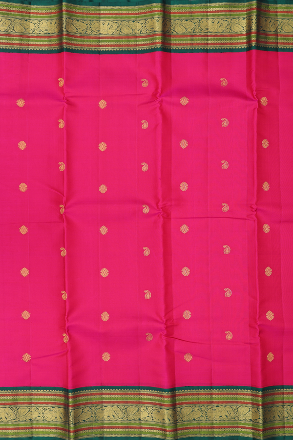 Kanchipuram Silk Saree In Rani Pink With Paisley Buttas