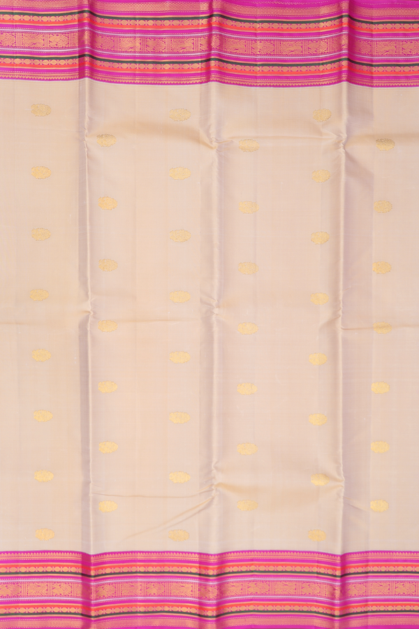 Kanchipuram Silk Saree In Cream Color With Peacock Buttas