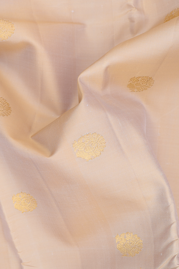 Kanchipuram Silk Saree In Cream Color With Peacock Buttas