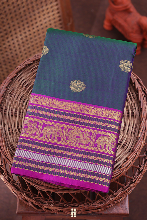 Kanchipuram Silk Saree In Prussian Blue With Peacock Buttas