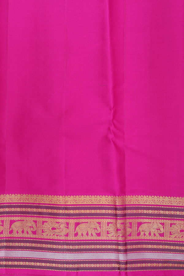 Kanchipuram Silk Saree In Prussian Blue With Peacock Buttas