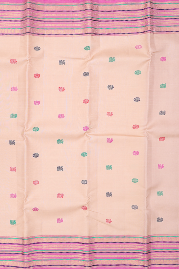 Kanchipuram Silk Saree In Cream Color With Peacock Buttas