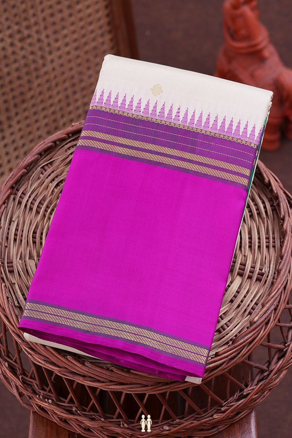Kanchipuram Silk Saree In Cream Color With Zari Buttas