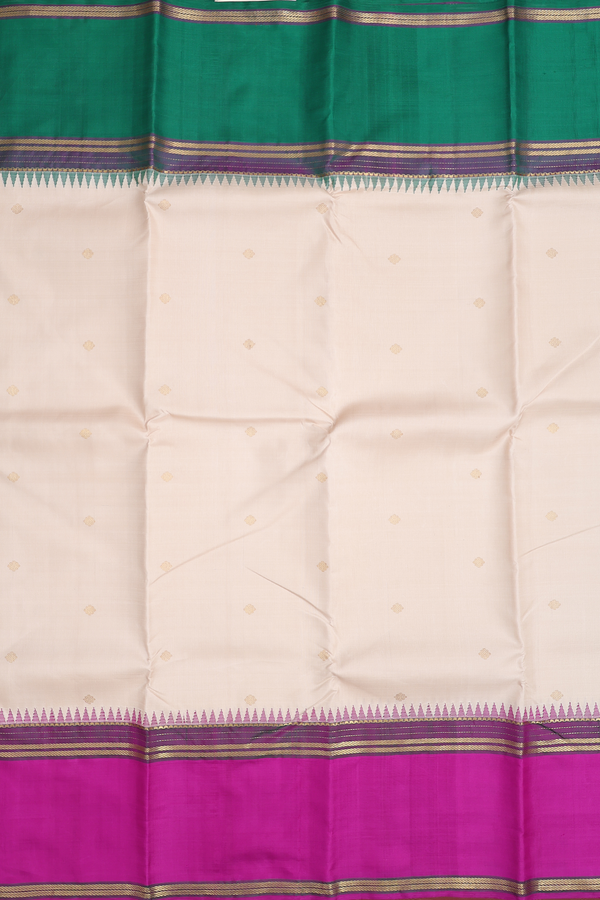 Kanchipuram Silk Saree In Cream Color With Zari Buttas
