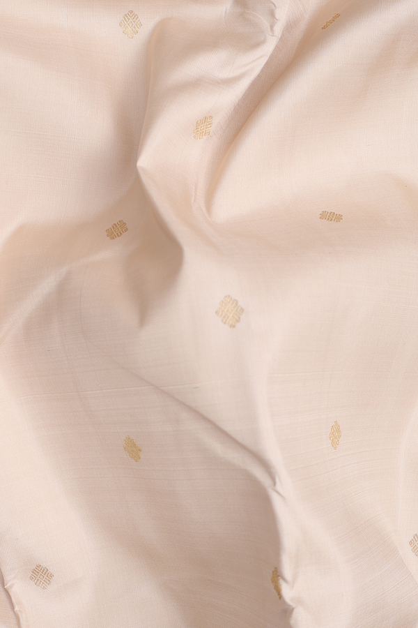 Kanchipuram Silk Saree In Cream Color With Zari Buttas