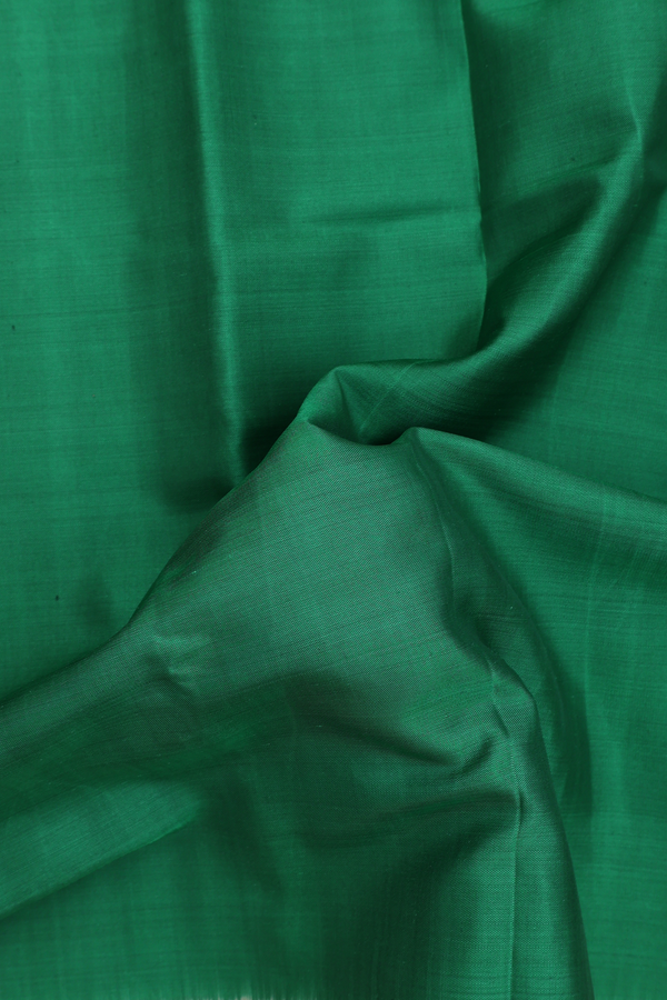 Patola Silk Saree In Emerald Green With Contrast Border