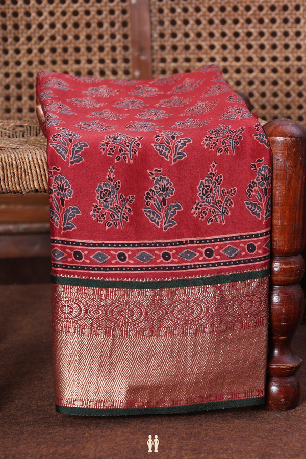 Georgette Saree In Brick Red With Floral Buttas