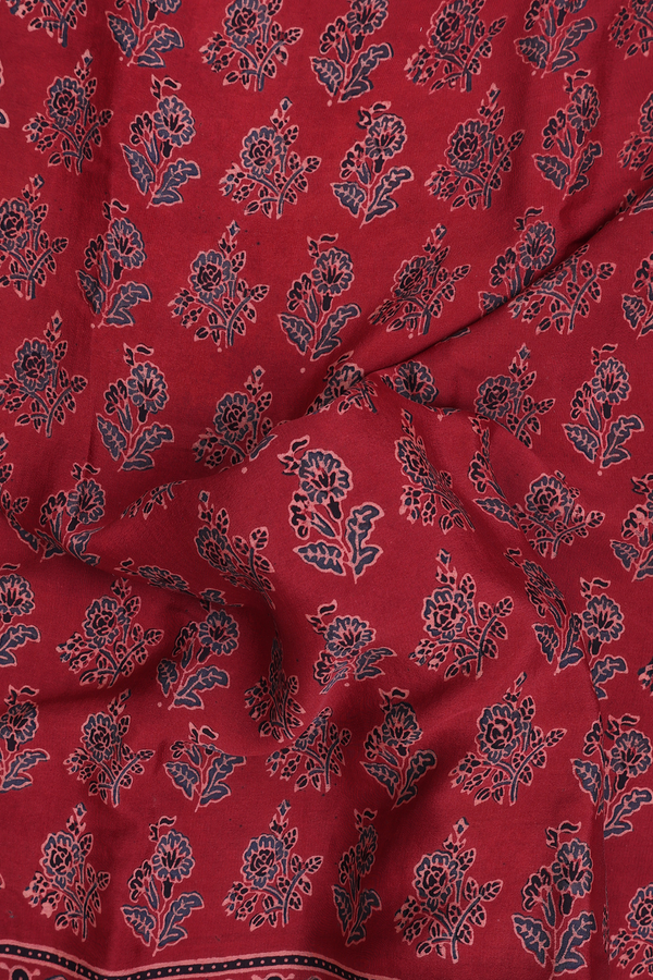 Georgette Saree In Brick Red With Floral Buttas