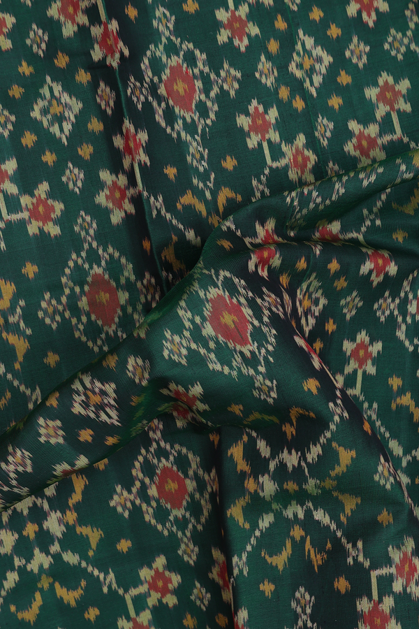 Patola Silk Saree In Forest Green With Ikat Design