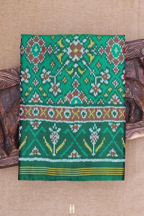 Patola Silk Saree In Green With Ikat Design