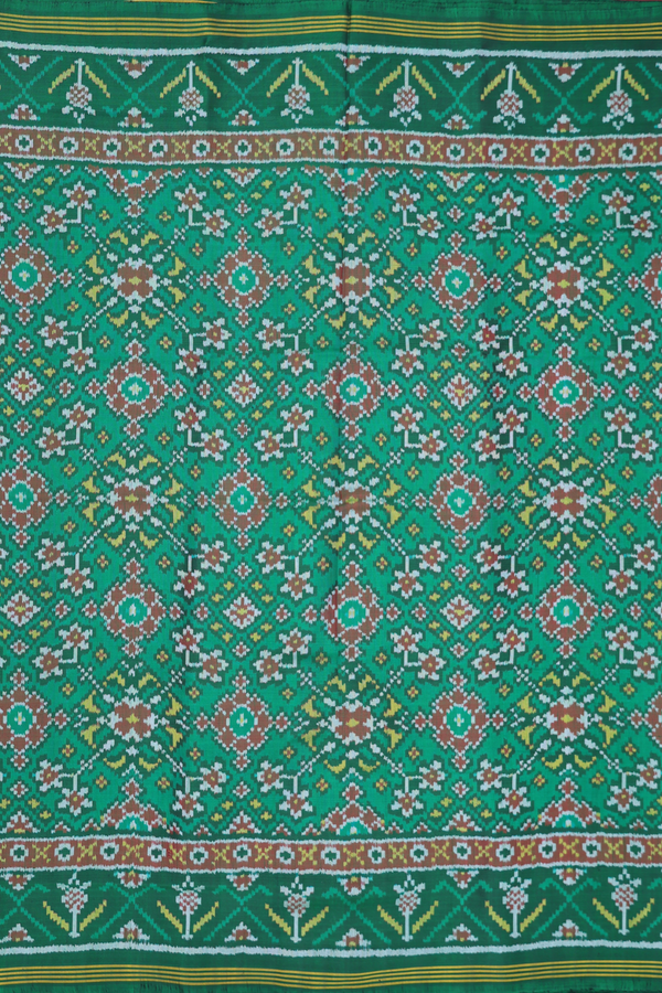 Patola Silk Saree In Green With Ikat Design