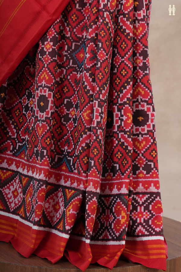 Patola Silk Saree In Red With Ikat Design