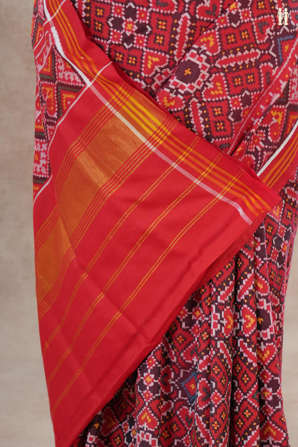 Patola Silk Saree In Red With Ikat Design