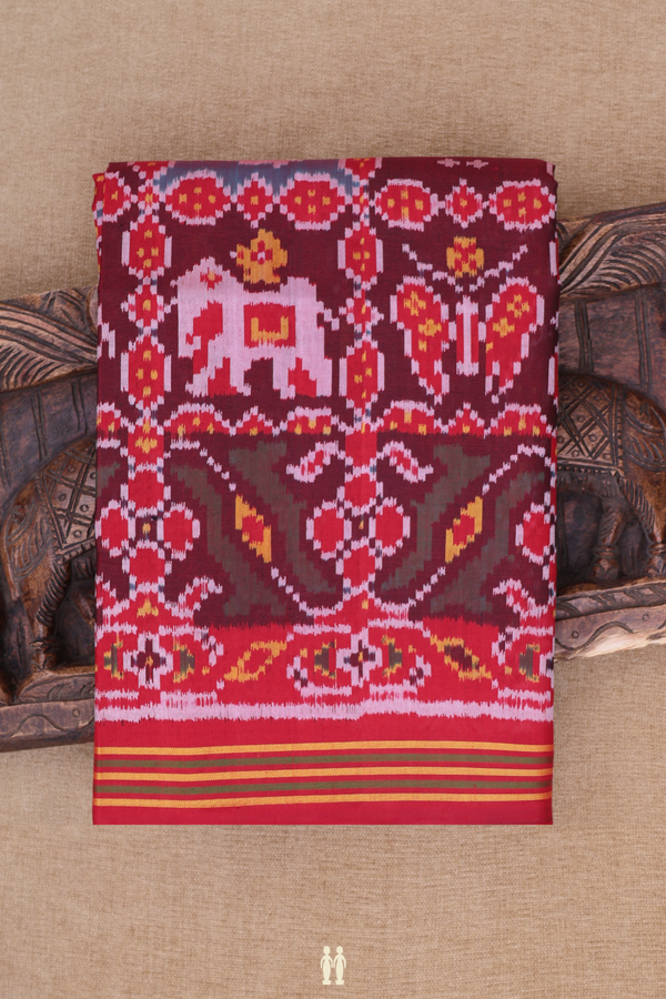 Patola Silk Saree In Maroon With Ikat Design