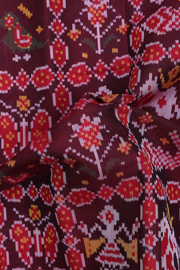 Patola Silk Saree In Maroon With Ikat Design