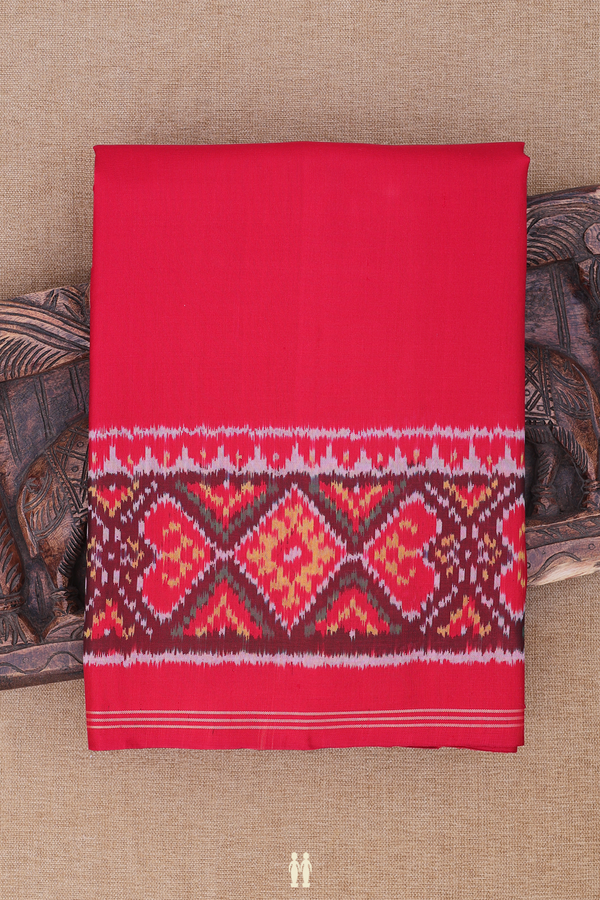 Patola Silk Saree In Plain Chilli Red With Ikat Border