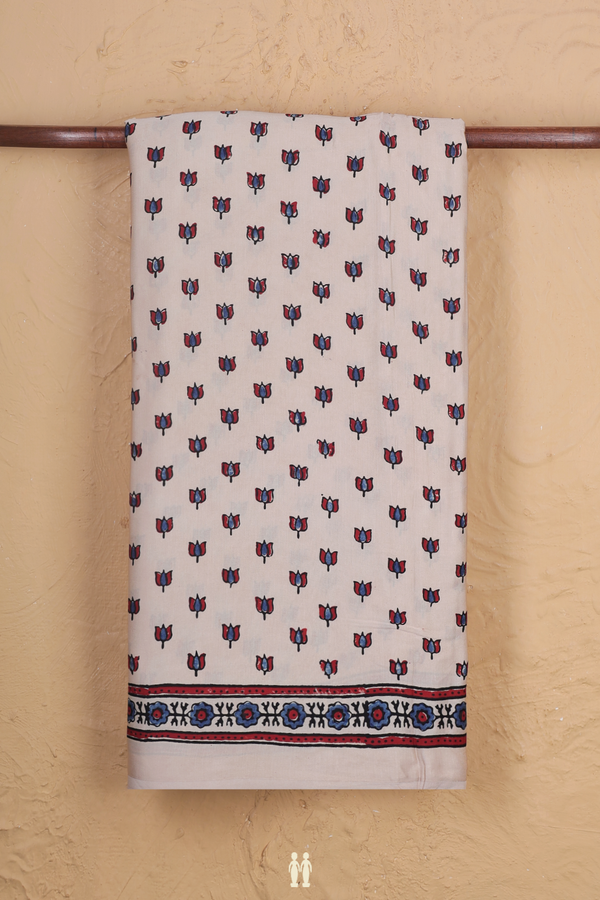 Modal Silk Saree In Cream Color With Floral Buttas