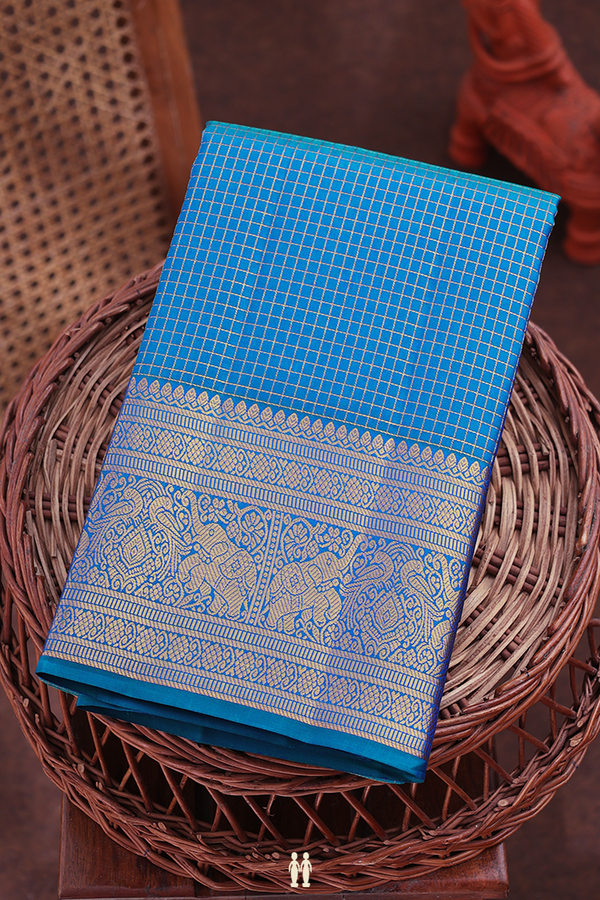 Kanchipuram Silk Saree In Peacock Blue With Checks Design