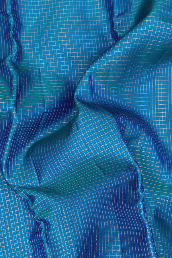 Kanchipuram Silk Saree In Peacock Blue With Checks Design