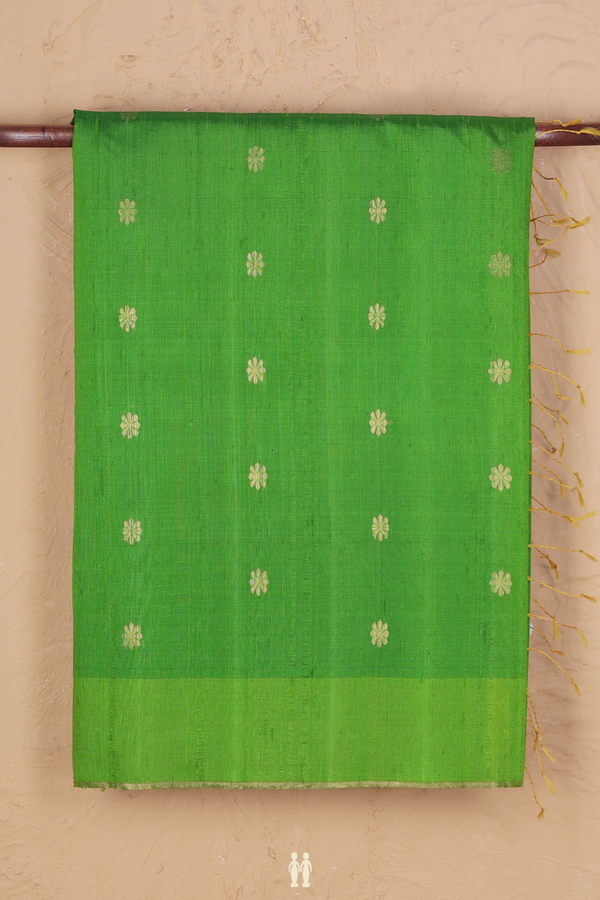 Raw Silk Saree In Parrot Green With Floral Buttas