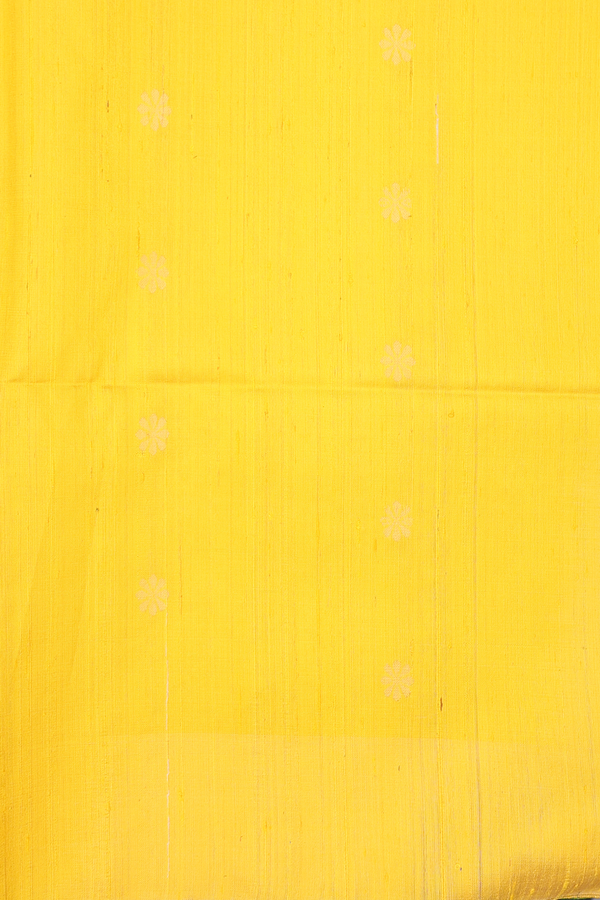 Raw Silk Saree In Parrot Green With Floral Buttas