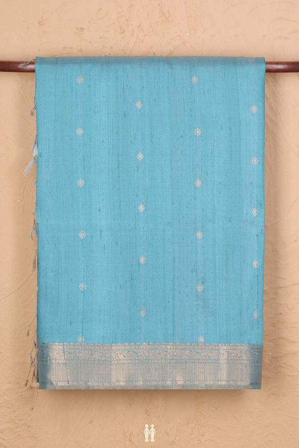 Raw Silk Saree In Blue With Floral Buttas