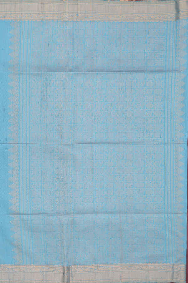 Raw Silk Saree In Blue With Floral Buttas