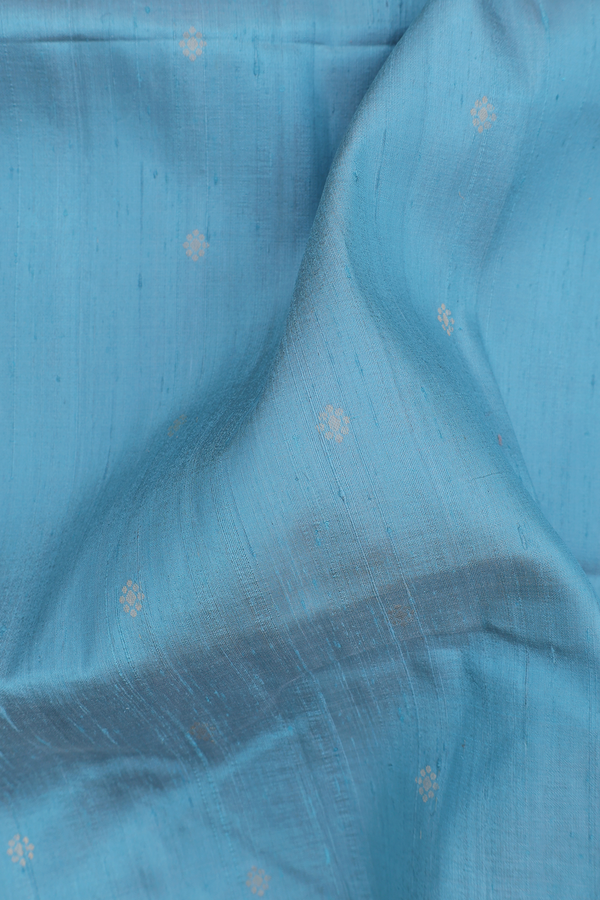 Raw Silk Saree In Blue With Floral Buttas