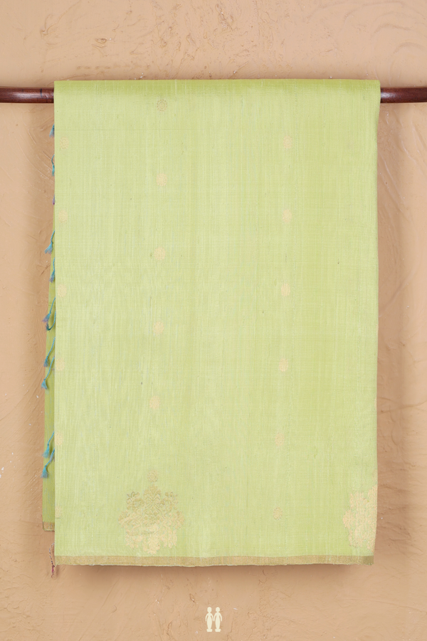 Raw Silk Saree In Green With Floral Buttas