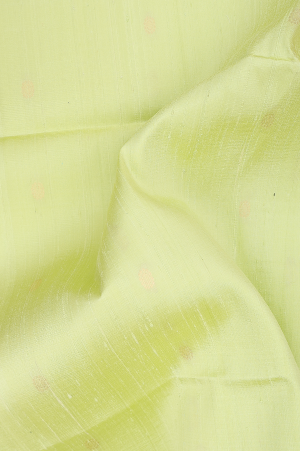 Raw Silk Saree In Green With Floral Buttas