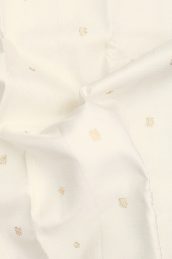 Kanchipuram Silk Saree In White With Peacock Buttas