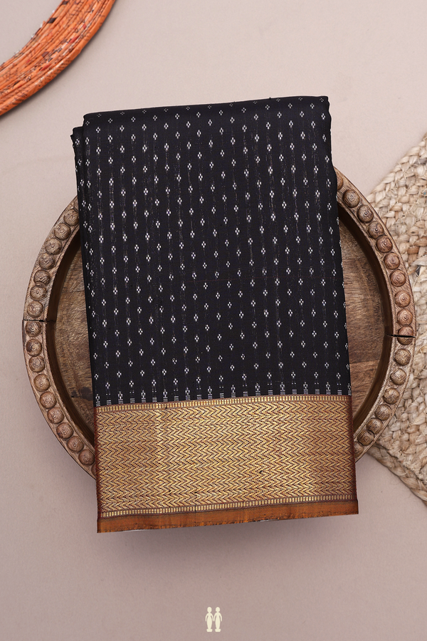 Kanchipuram Silk Saree In Black With Allover Zari Buttis