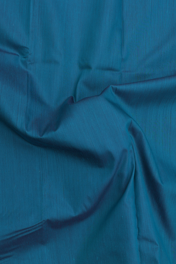 Apoorva Cotton Saree In Teal Blue With Peacock Border