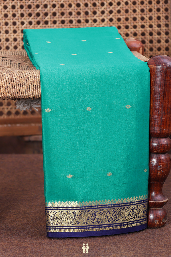 Mysore Silk Saree In Bluish Green With Zari Buttis