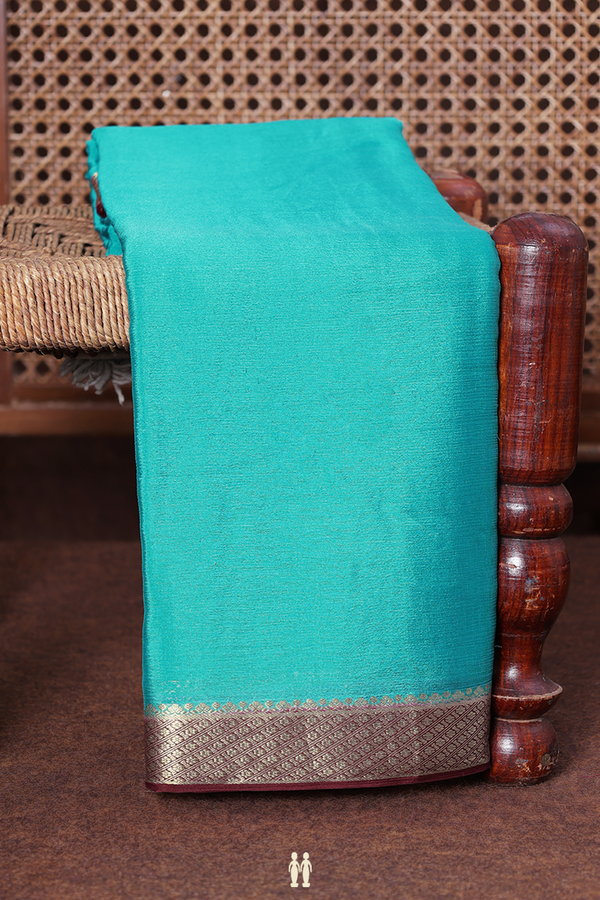 Chiffon Saree In Bluish Green With Contrast Border