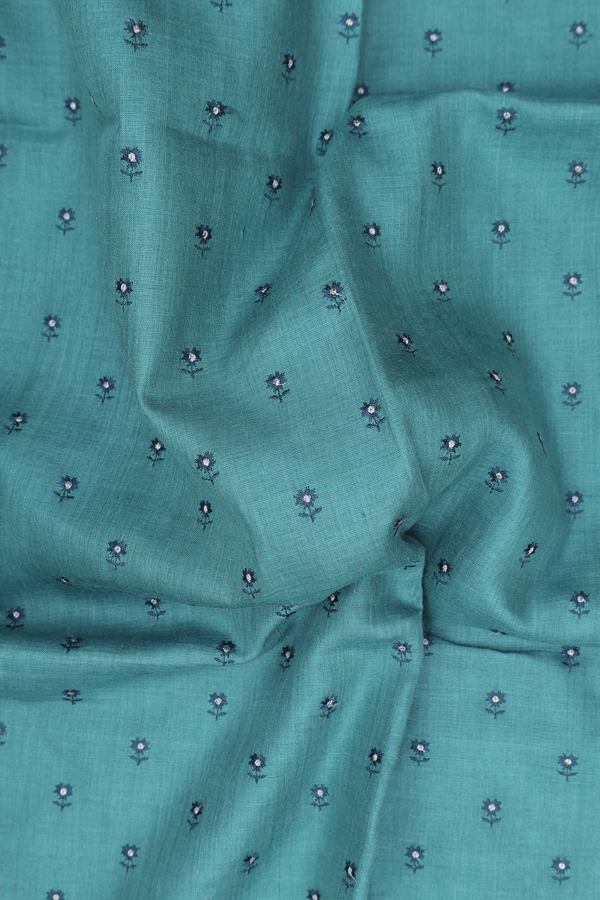 Tussar Silk Saree In Turkish Blue With Floral Buttis