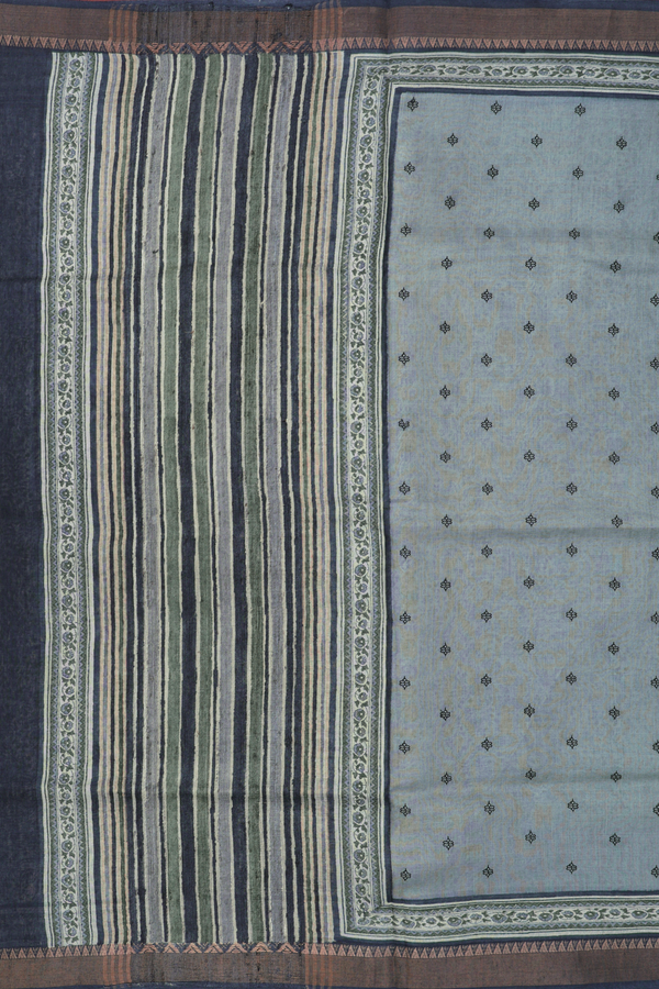 Tussar Silk Saree In Greenish Grey With Floral Buttis
