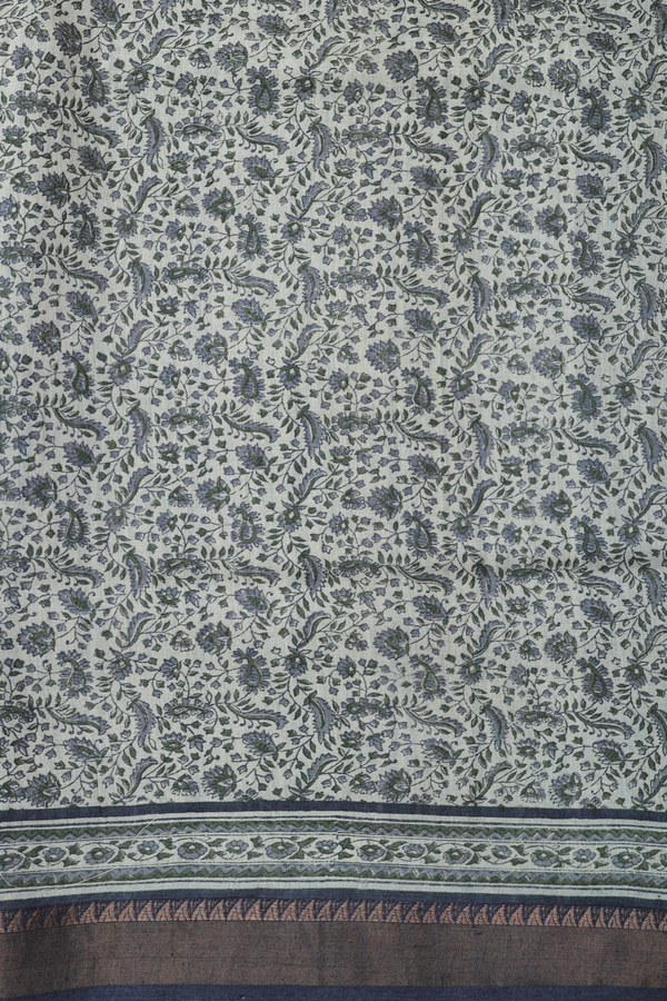 Tussar Silk Saree In Greenish Grey With Floral Buttis