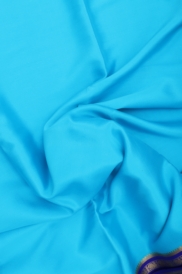 Mysore Silk Saree In Cerulean Blue With Peacock Border