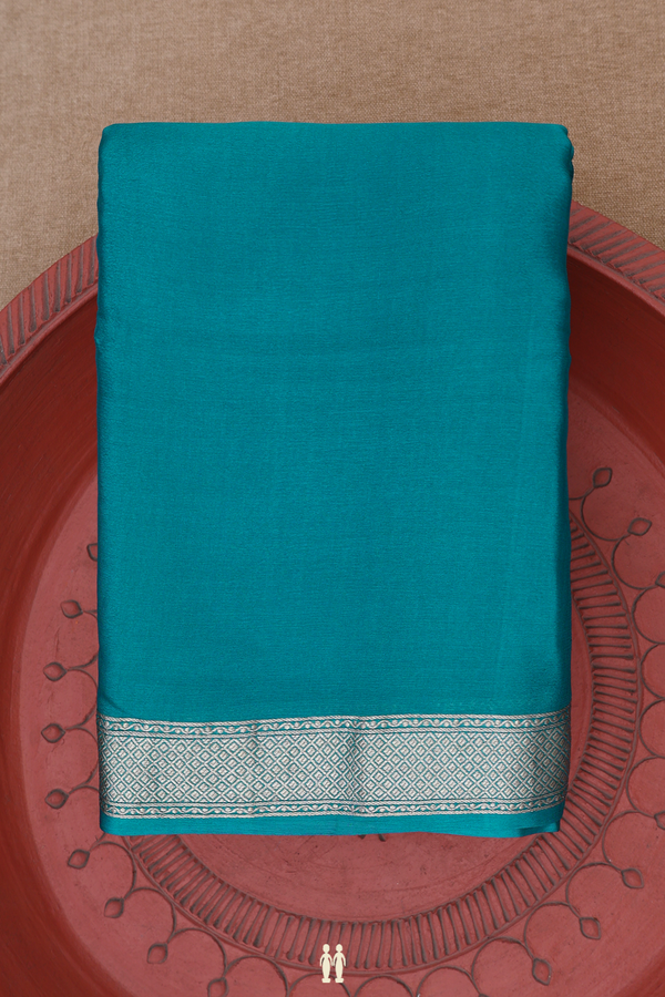 Chiffon Saree In Plain Peacock Blue With Zari Border